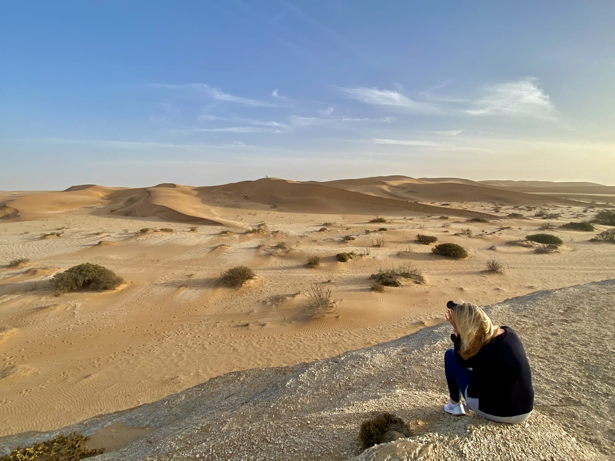 Guest seated overlooking the Namib dunes at Desert Breeze