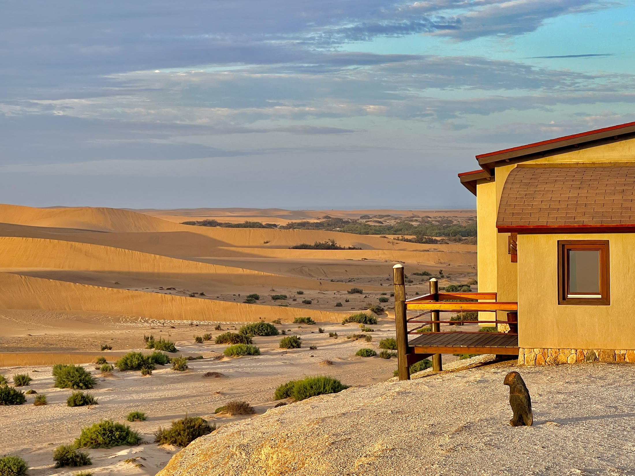 Desert Breeze bungalow overlooking the sunlit Namib dunes