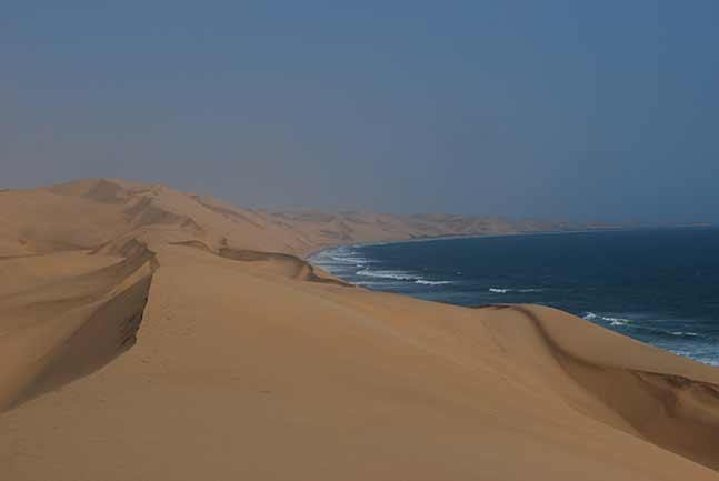 Sandwich Harbour dunes meeting the Atlantic Ocean