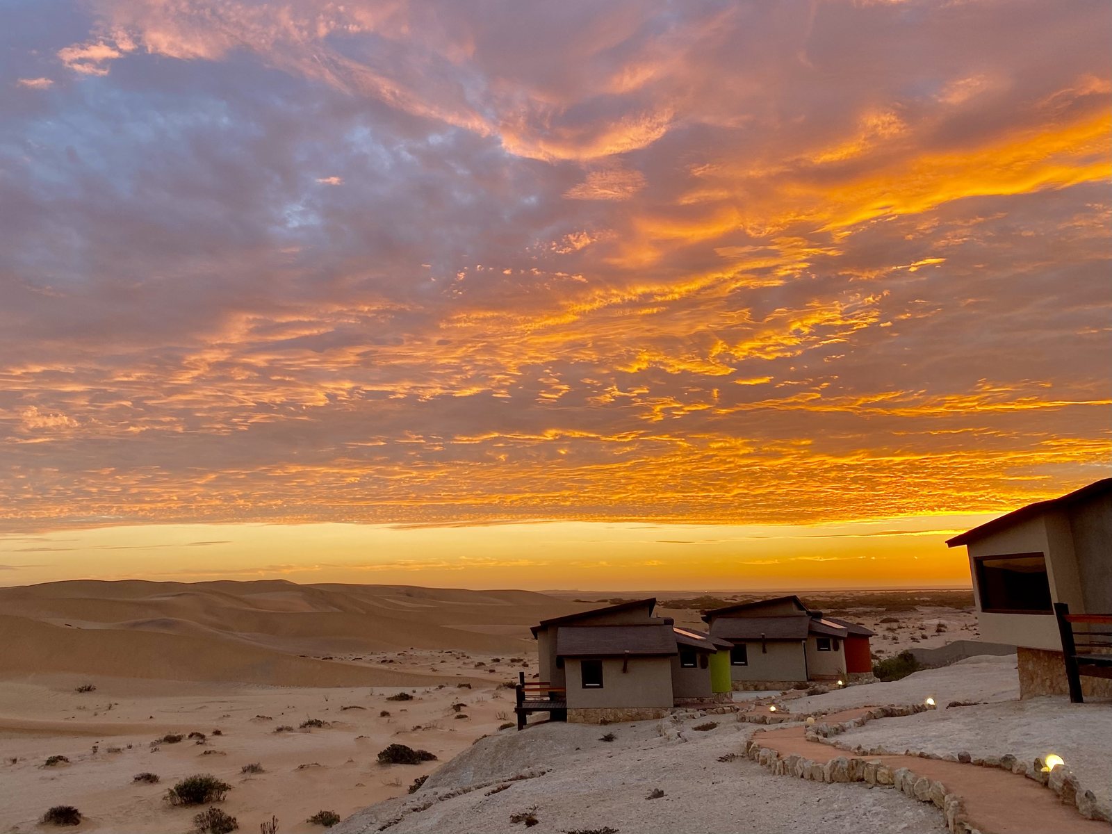 Desert Breeze bungalow silhouette at sunset