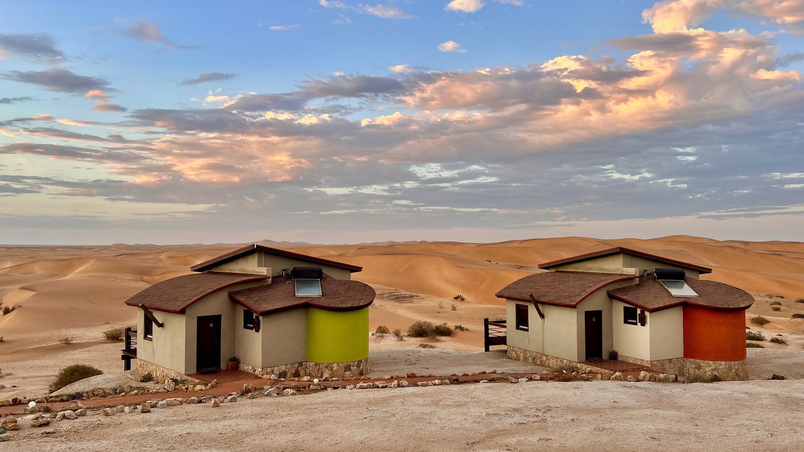 Desert Breeze bungalows beneath a wide desert sky