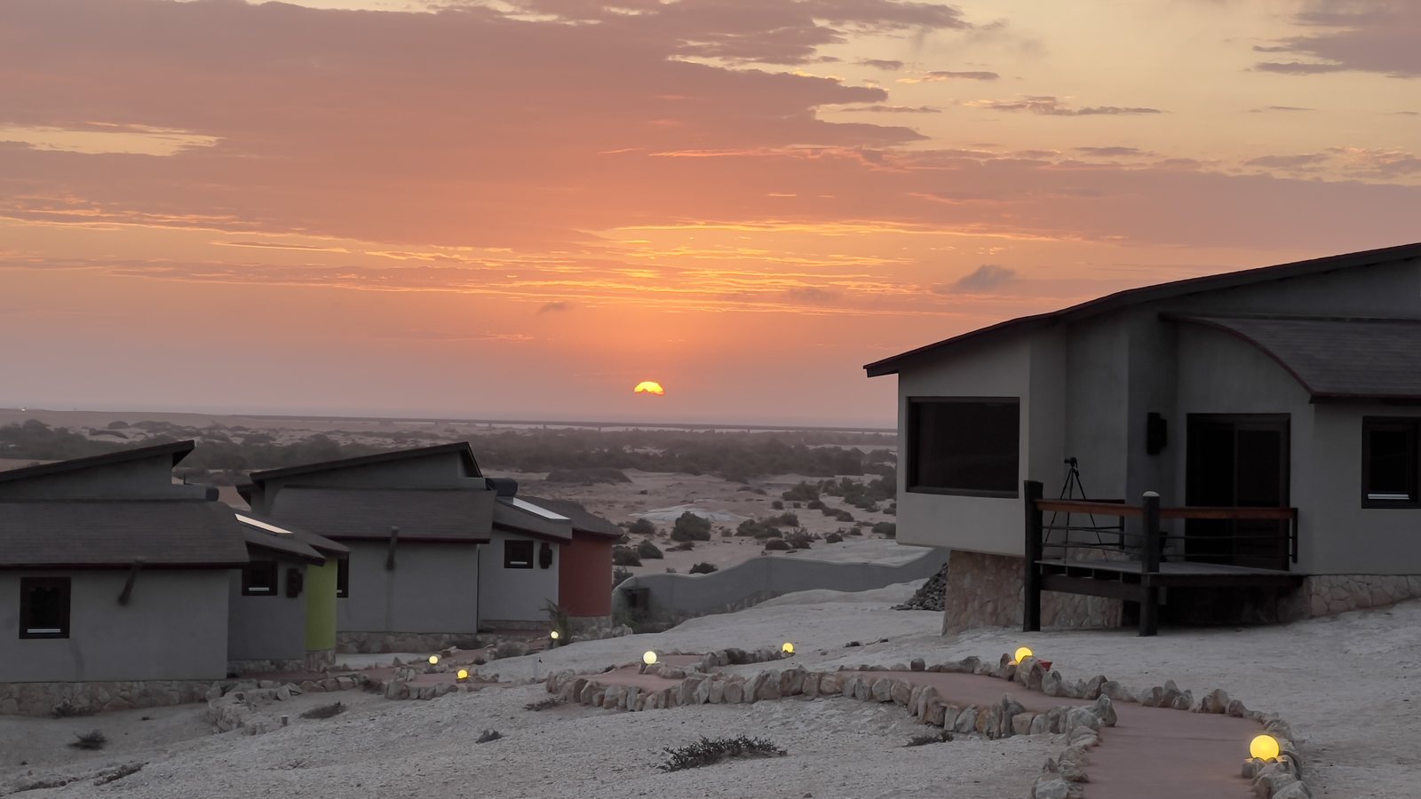 Desert Breeze lodge lights at sunset