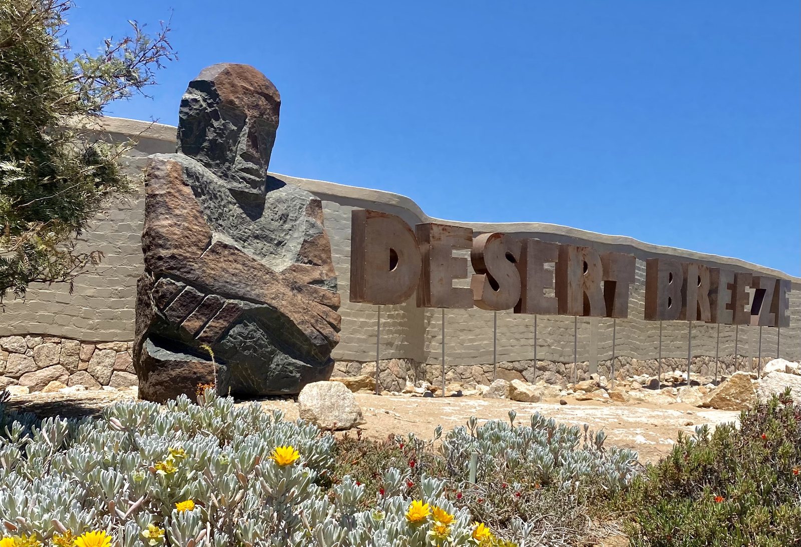 Desert Breeze entrance sculpture and sign