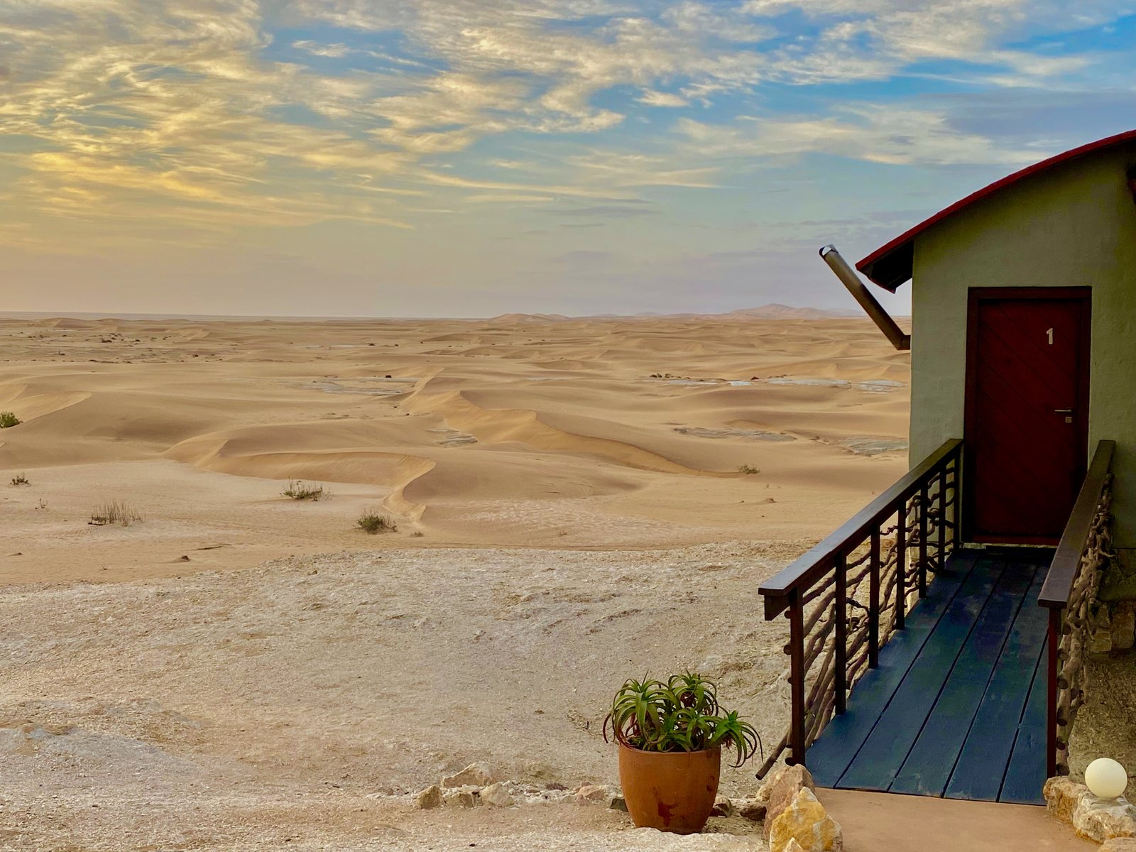 Desert Breeze bungalow entrance above the dunes