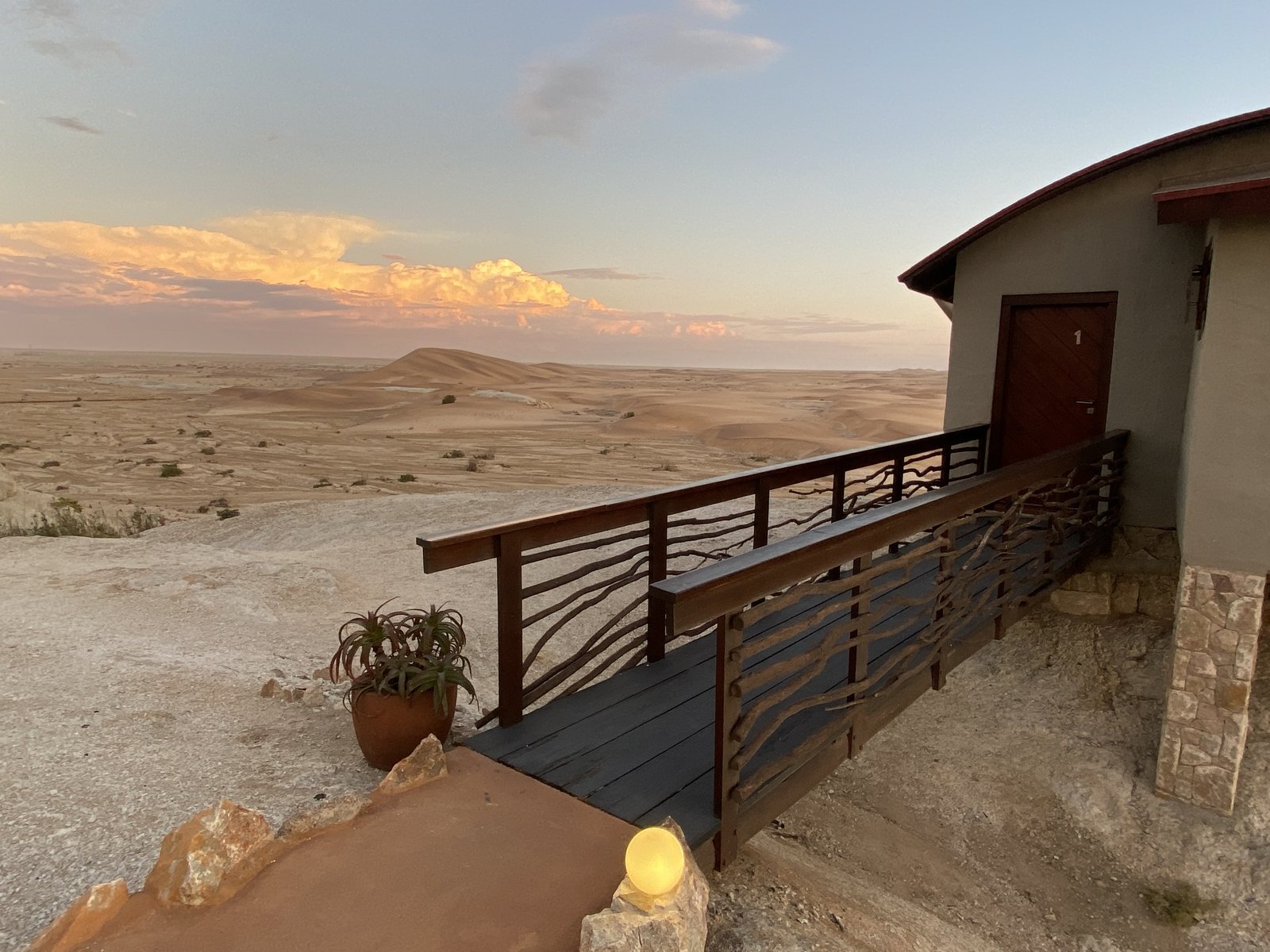 Desert Breeze terrace walkway beside the dunes