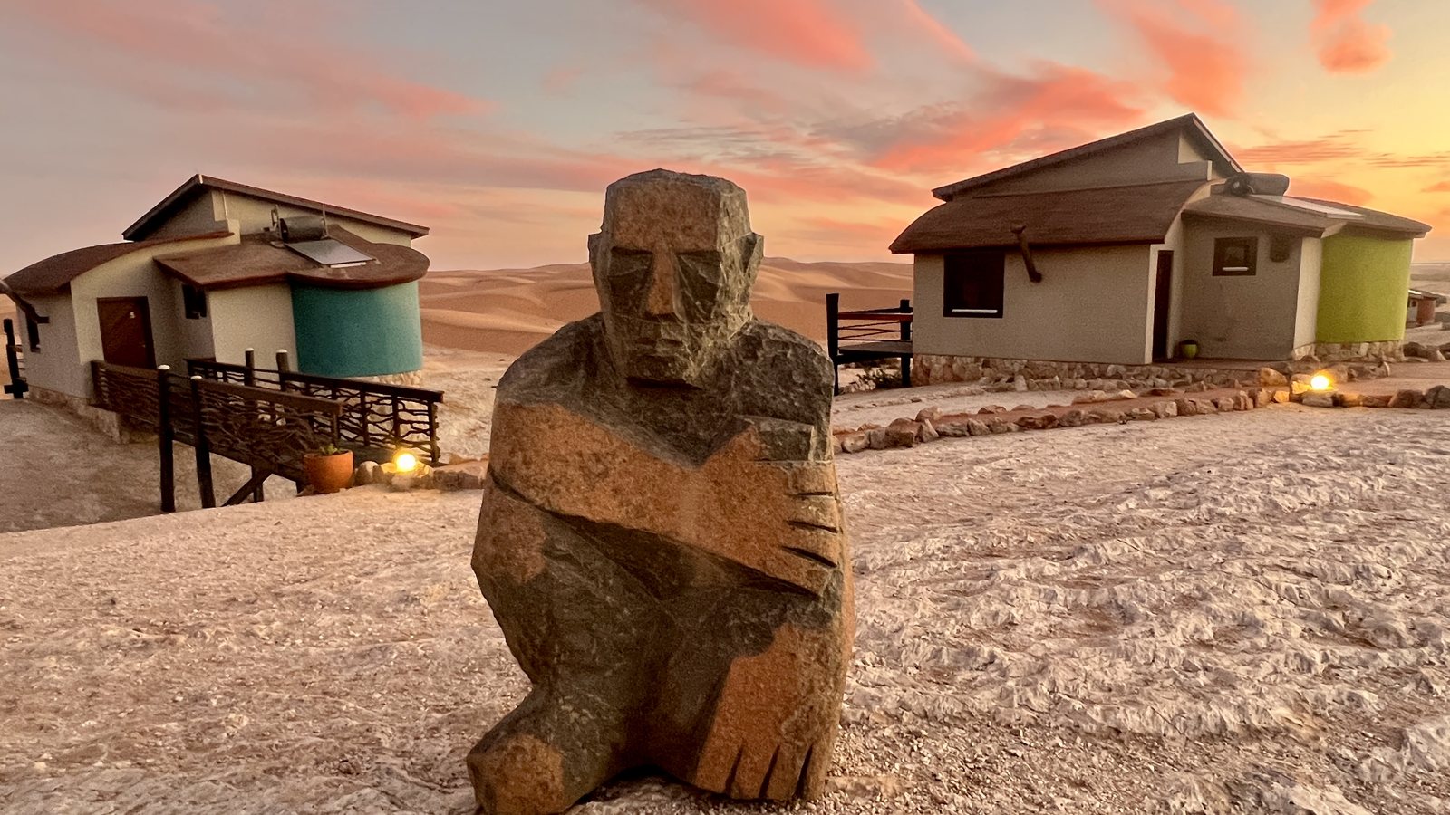 Desert Breeze lodges glowing at sunset