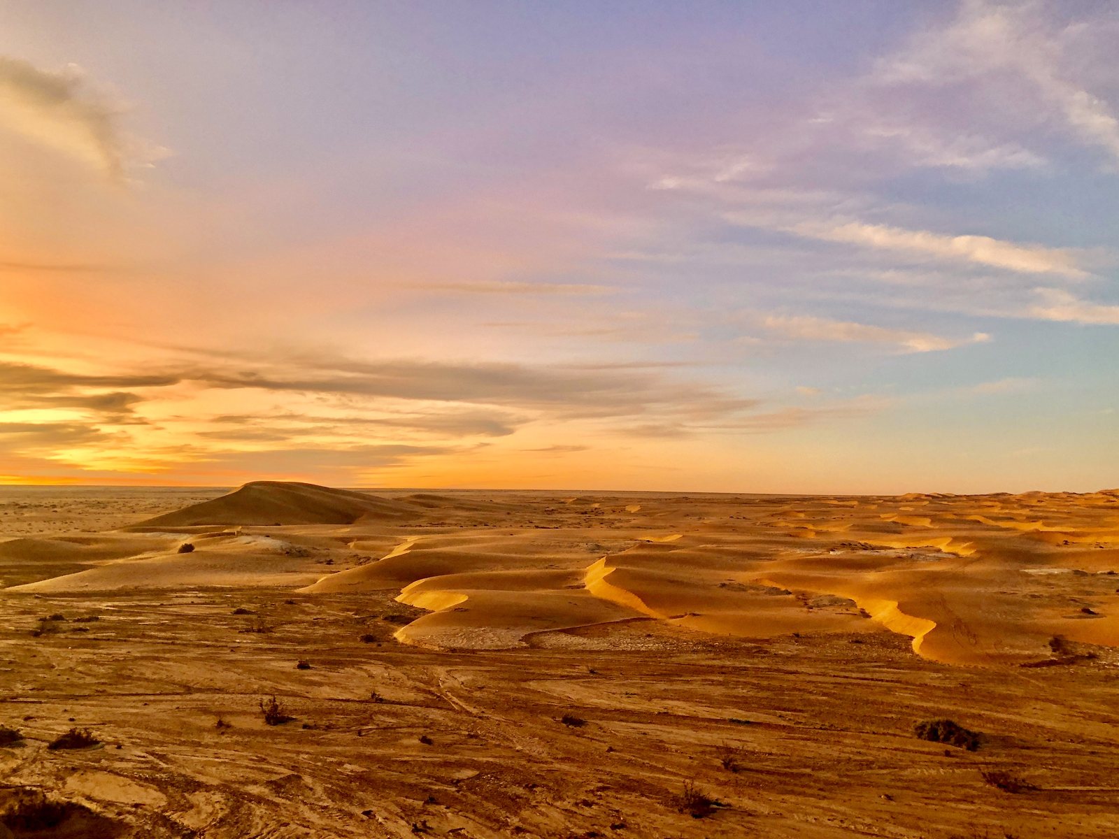 Golden dune textures at sunset