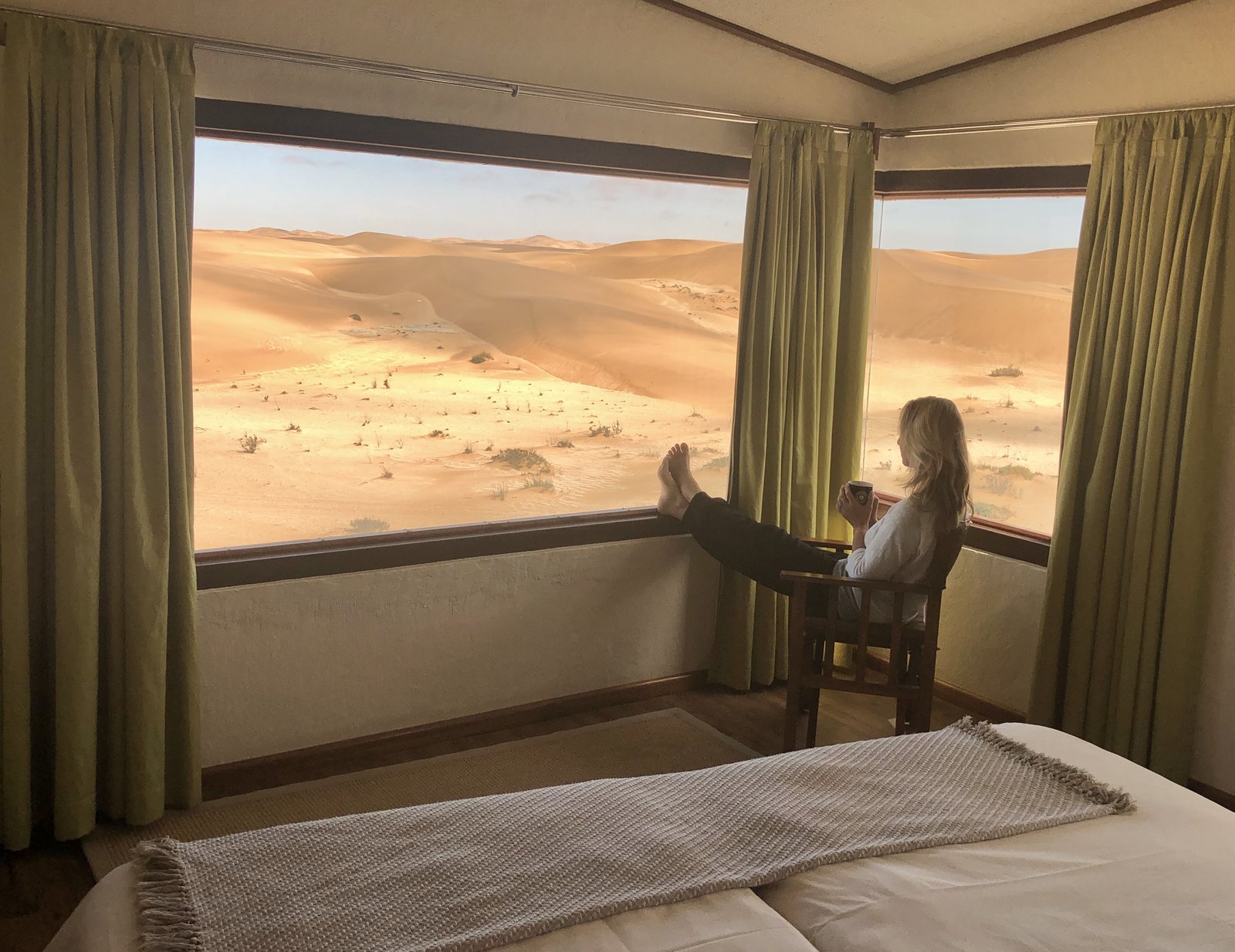 Desert Breeze bungalow bedroom looking out to the dunes